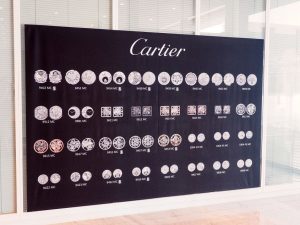 Showing the wall of the change as cartier movements were updated throughout the history of the company 