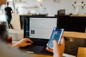 Slack apps on a phone and laptop