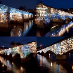 Bridge made of discarded products illuminated in the night