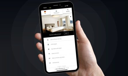 Black backround with a hand holding a phone. On the phone you can see the interface of a Webapplication to manage you hotel booking. You see the information folder, informations about gastronomy, about spa and further features.