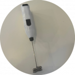 handheld milk frother to froth milk and make latte art