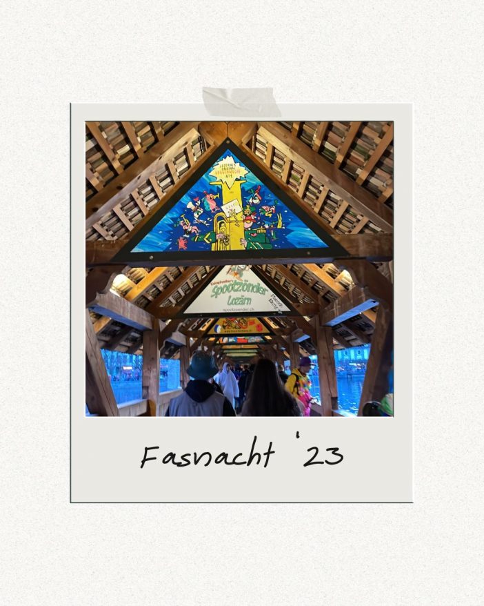 Polaroid-style photo labeled “Fasnacht ’23” showing the illuminated wooden ceiling panels of Lucerne’s iconic Kapellbrücke, decorated for the Swiss carnival season. People walk through the bridge, adding a festive and nostalgic atmosphere to the scene.