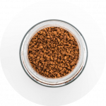 Instant coffee in a glass on white background
